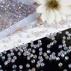 1100PCS 4mm Bicone Crystal Glass Beads for Jewelry Making, Sparkling Mini Beads for Suncatchers, DIY Bracelets & Craft Projects (AB Phantom Purple)